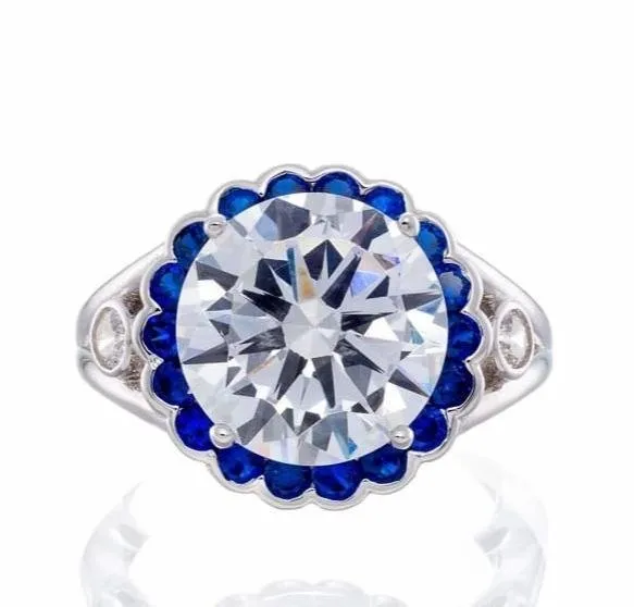 5 Carat Round Cut and Sapphire Blue Cubic Zirconia Halo Engagement Ring in White Gold Plated Sterling Silver