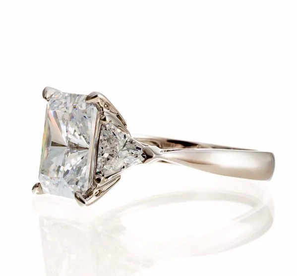 Radiant Cut Triangle Accent Cubic Zirconia Engagement Ring In Sterling Silver