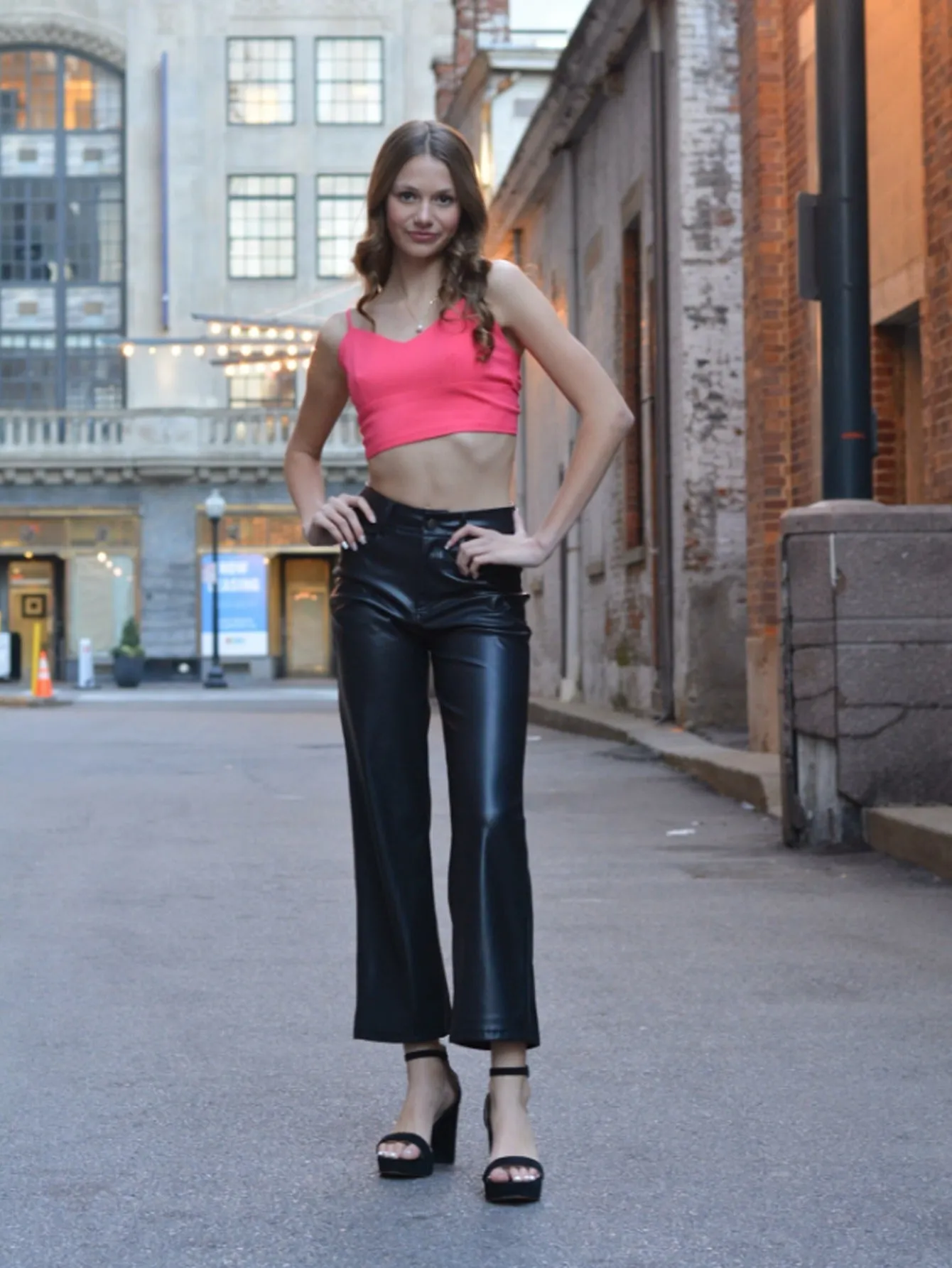 Step up your style game with our Women's Faux Leather Wide Leg Pants.