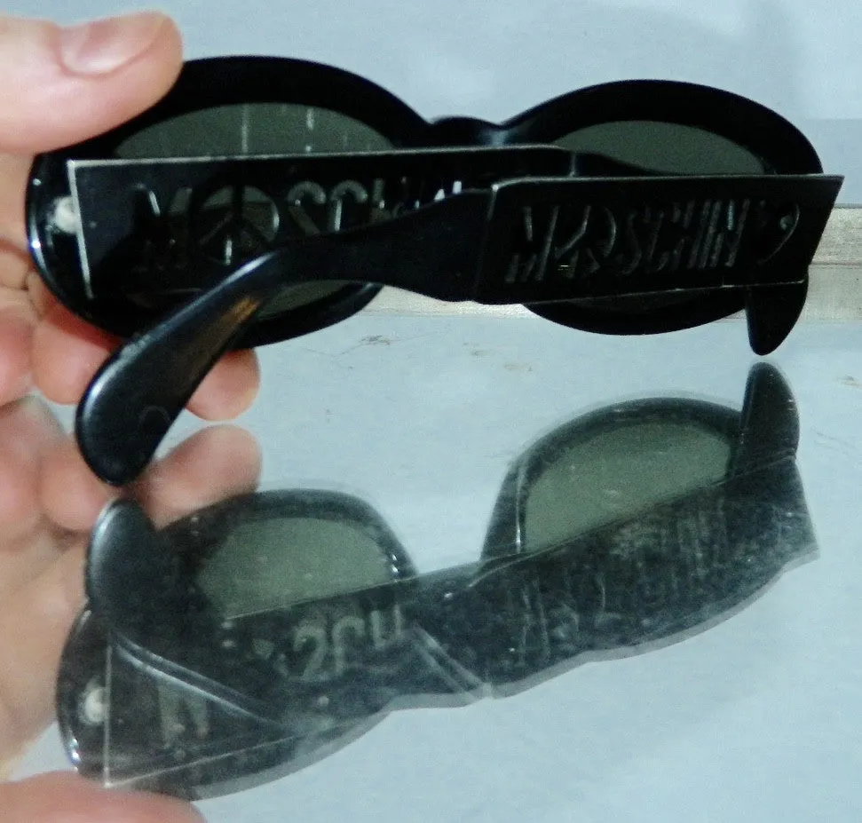 vintage 1990s MOSCHINO sunglasses cut out logo glasses frames black plastic