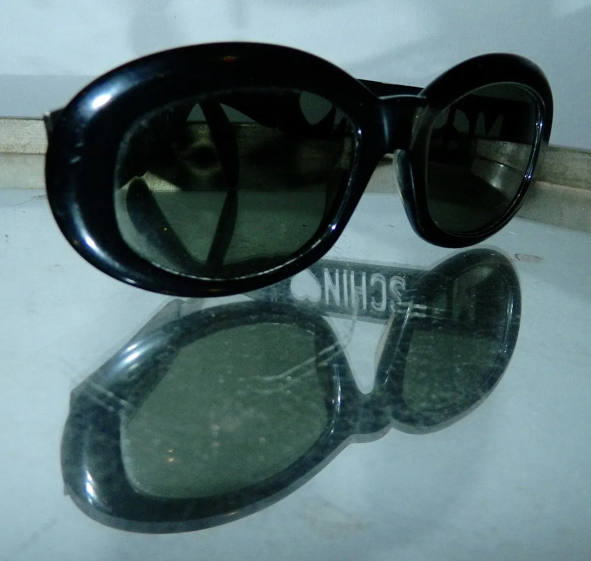 vintage 1990s MOSCHINO sunglasses cut out logo glasses frames black plastic