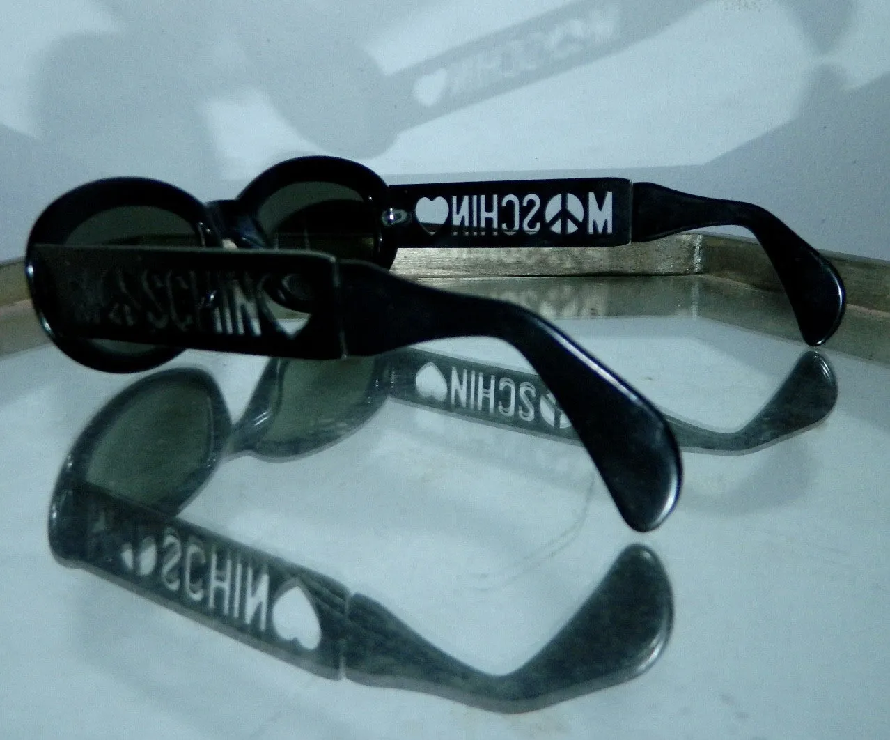 vintage 1990s MOSCHINO sunglasses cut out logo glasses frames black plastic